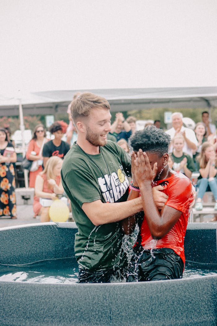 about-03 Joyful outdoor baptism ceremony at a community gathering in Clemson.